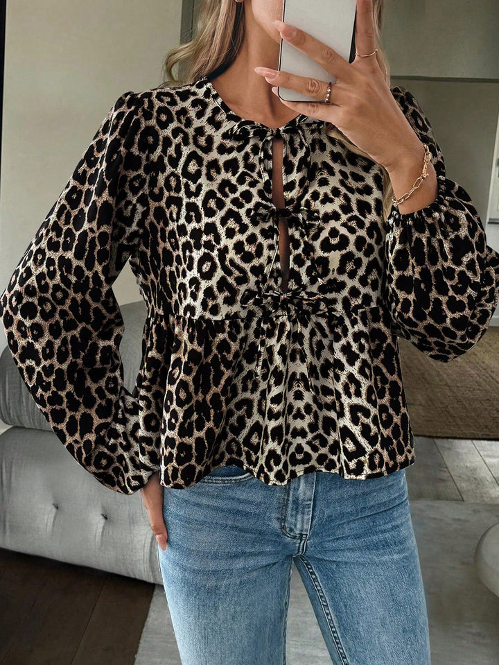Leopardprint Damesblouse met Strikdetail – Vrouwelijk, Opvallend & Trendbewust