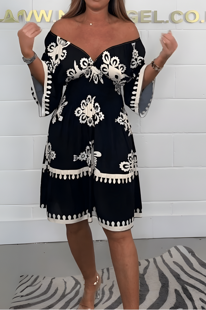 Elegante jurk met patroon en V-hals – perfect voor elke gelegenheid