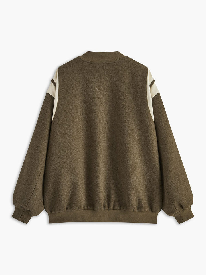 Molly | Lässige Varsity-Jacke im Retro-Stil mit gestreiften Ärmeldetails und Rippbündchen