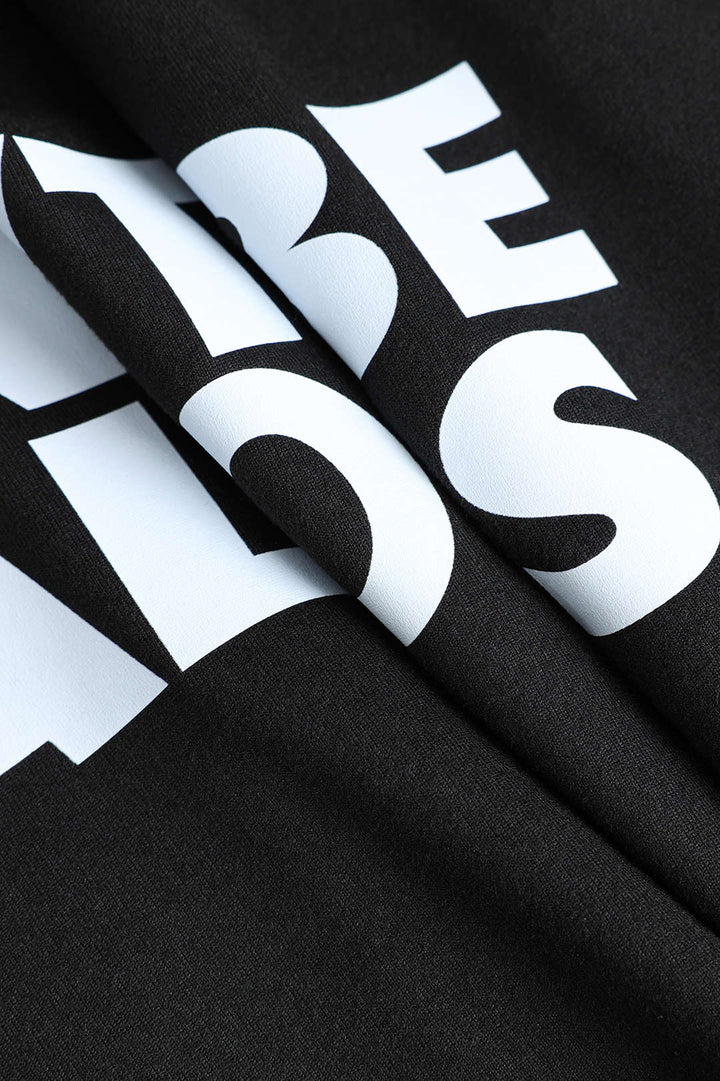Braelyn | Zwart Korte Mouwen Cropped T-Shirt met "Wees Niet Jalours"-Print