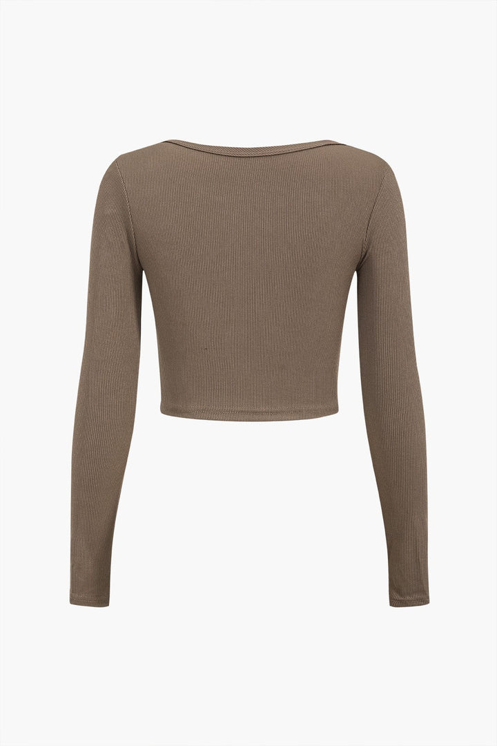 Amira | Asymmetrisch Langarmtop met Cut-Out & Knopdetails