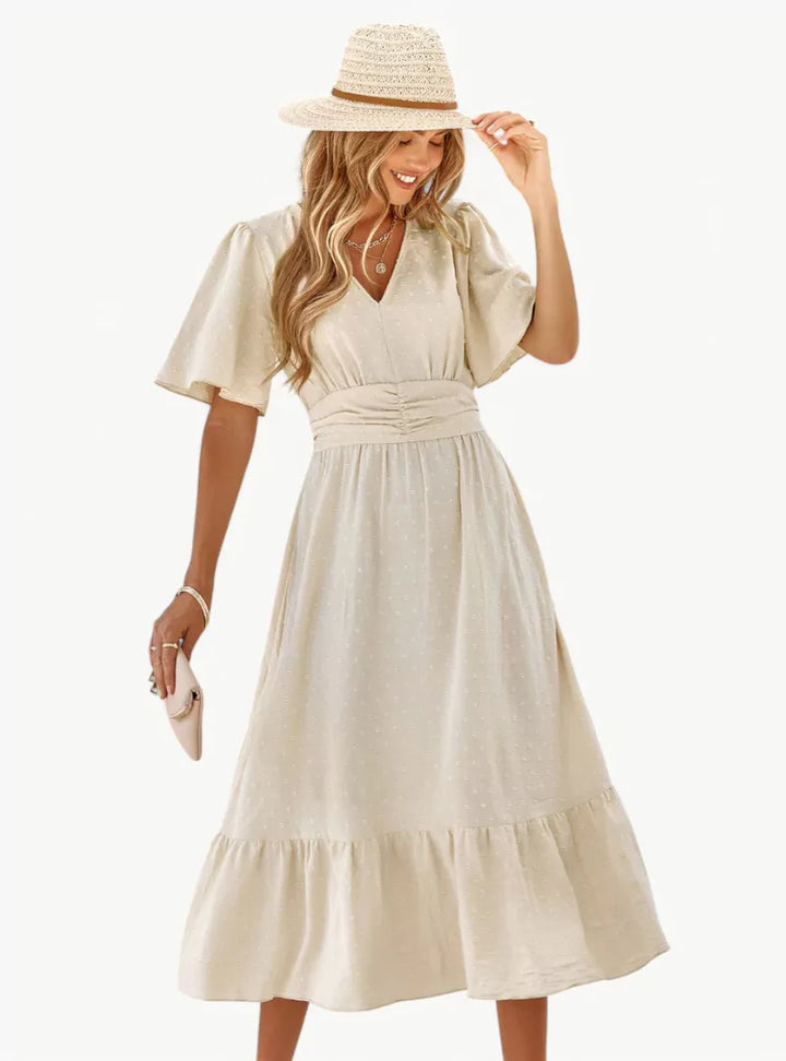 Midi-Sommerkleid mit V-Ausschnitt und Taillenbetonung – Locker & Feminin