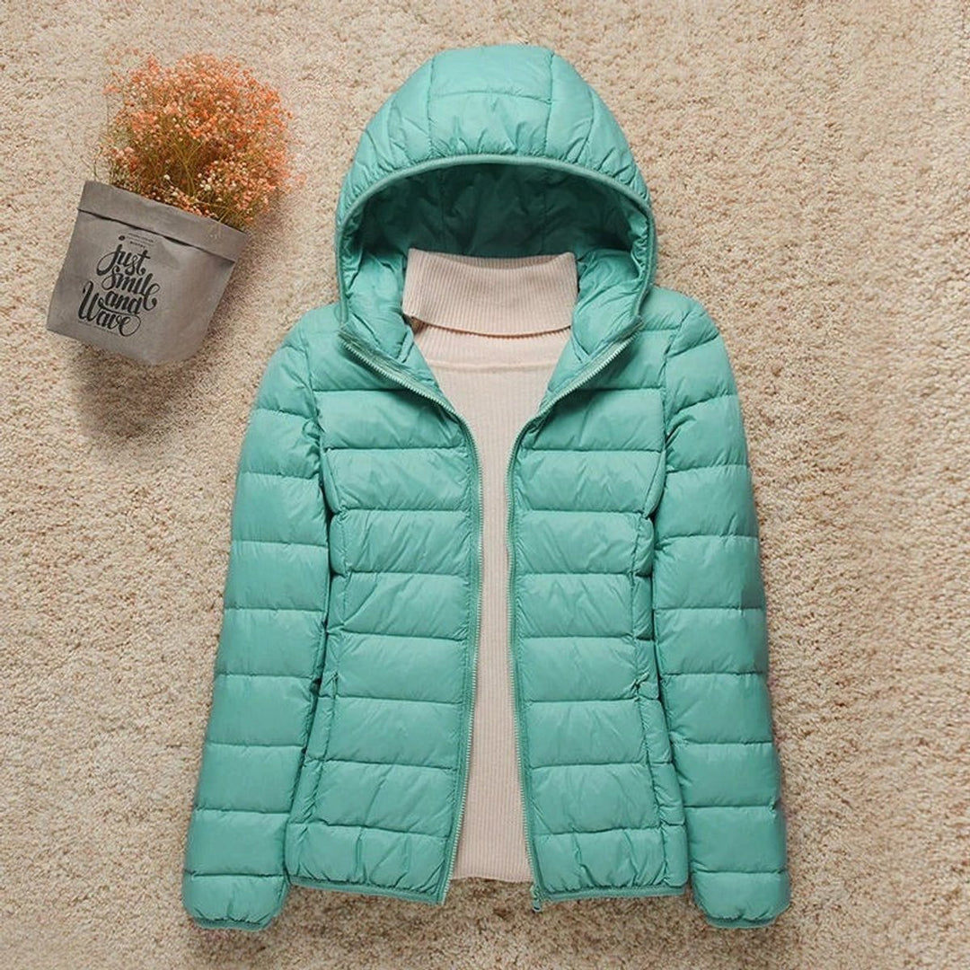 Gewatteerde jacket dames ultralight donsjack met capuchon - Turquoise