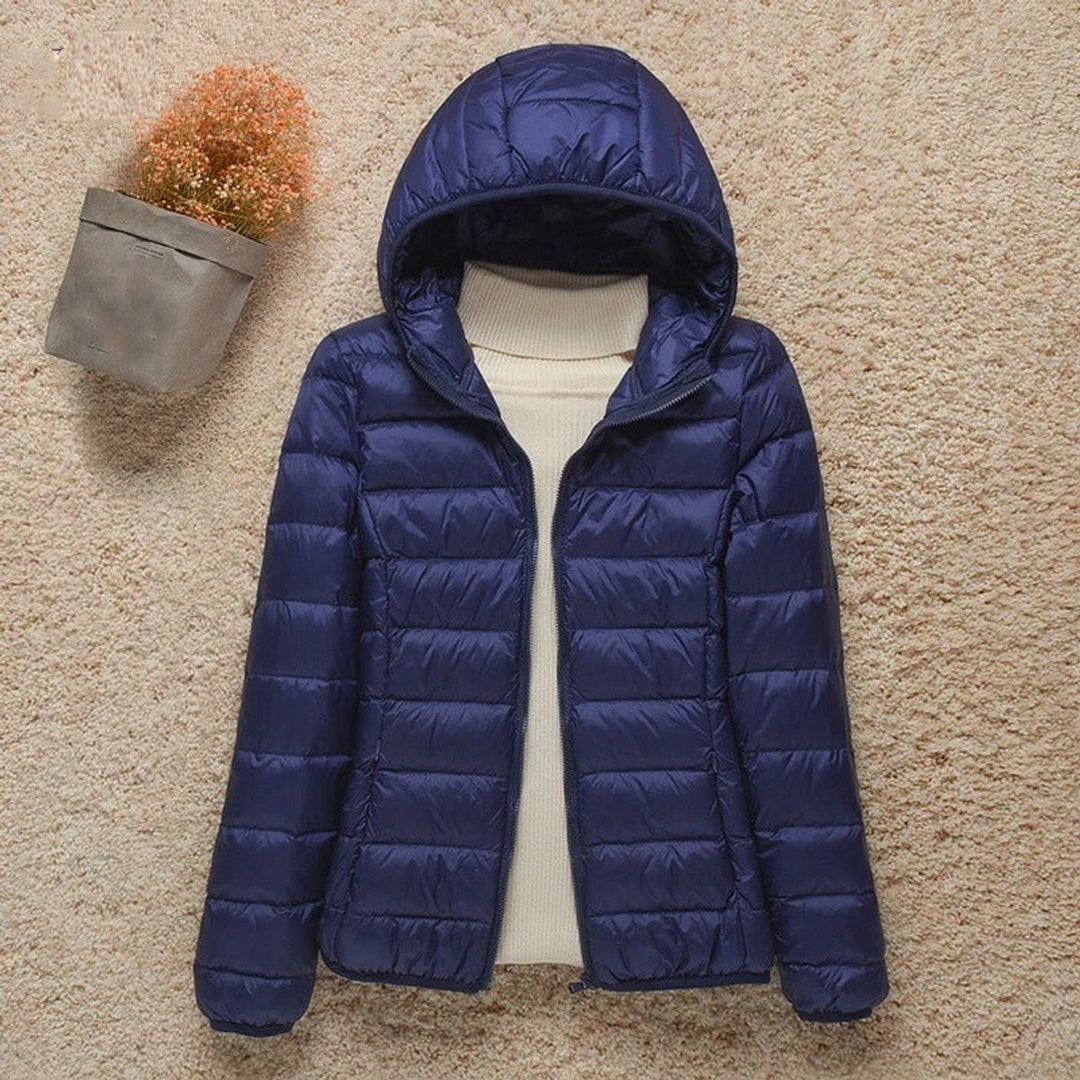 Gewatteerde jacket dames ultralight donsjack met capuchon - Marineblauw