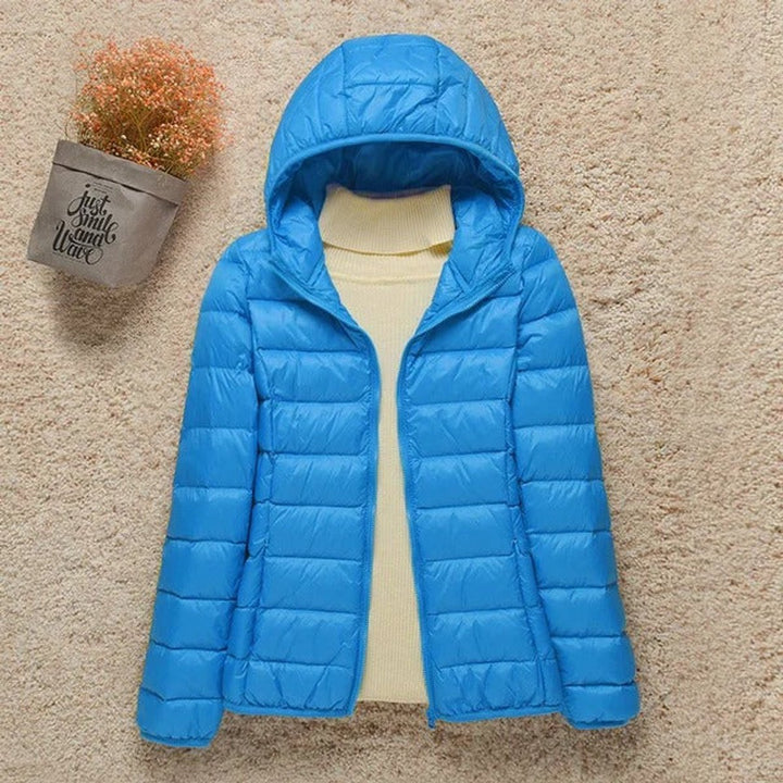 Gewatteerde jacket dames ultralight donsjack met capuchon - Lichtblauw