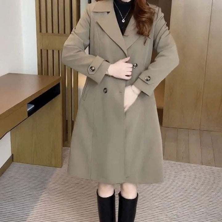 Lange trenchcoat dames getailleerd dubbele knopenrij reverskraag